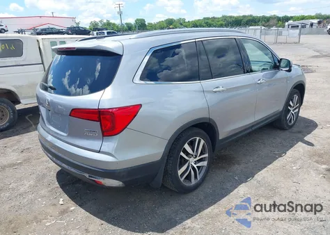 2017 Honda Pilot Touring z USA, uszkodzony, nr VIN 5FNYF6H98HB025426
